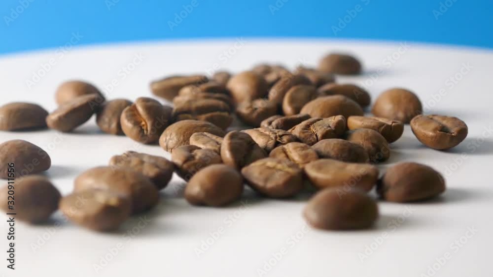 Rotating coffee on blue background Rotating coffee on blue background