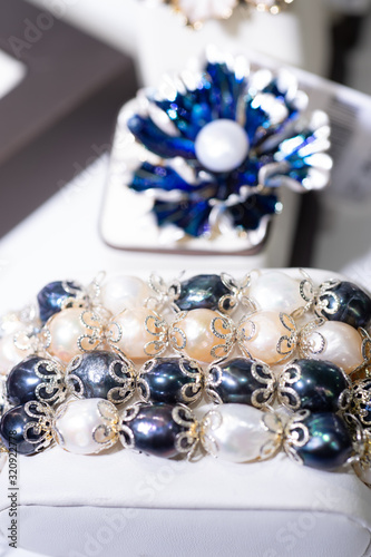 jewelry retail showcase display different pearl bracelets