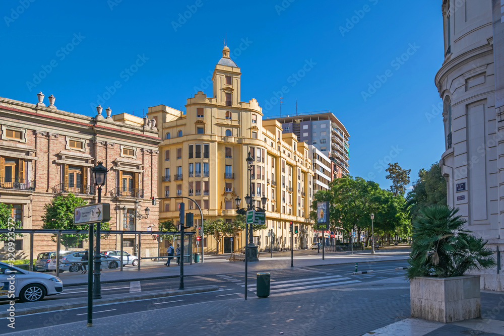 Plaza Tetuan with the Santo Domingo Convent and a residential building at  General Palanca Street, 1 in Valencia, Spain