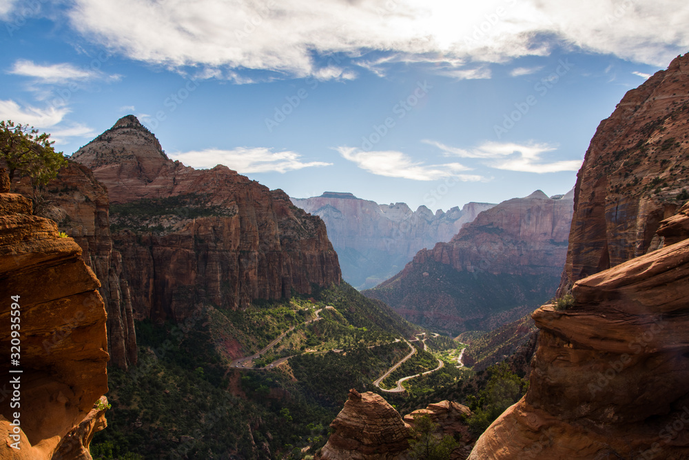 View of the winding mountain road from Canyon Overlook trail in Zion National Park