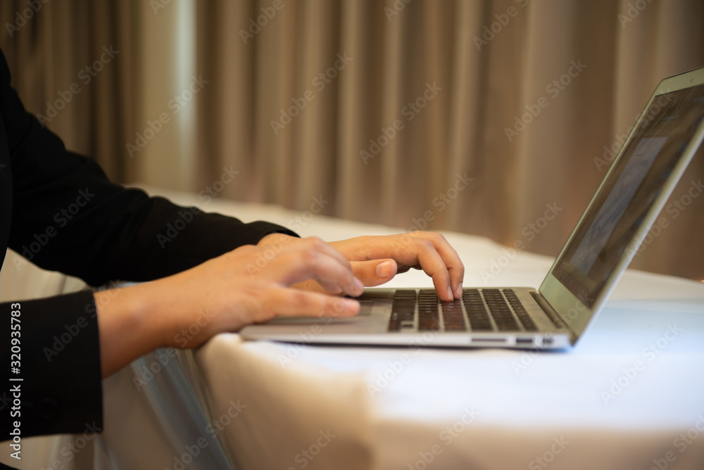 hands typing on laptop hands typing on laptop