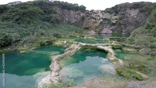 beautiful small waterfalls, Waterfall hidden in the (EL SALTO-EL MECO) san luis potosi Mexico photo