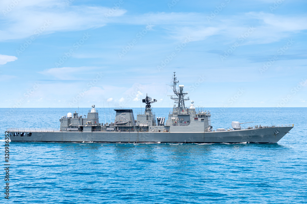 Guided missile frigate type navy ship sails in the sea to protect sea line of communcation or SLOC