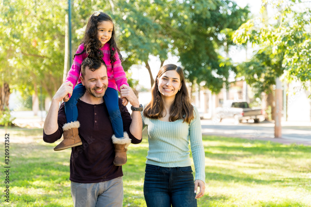 Happy Hispanic Family Enjoying Weekend Together Happy Hispanic Family Enjoying Weekend Together