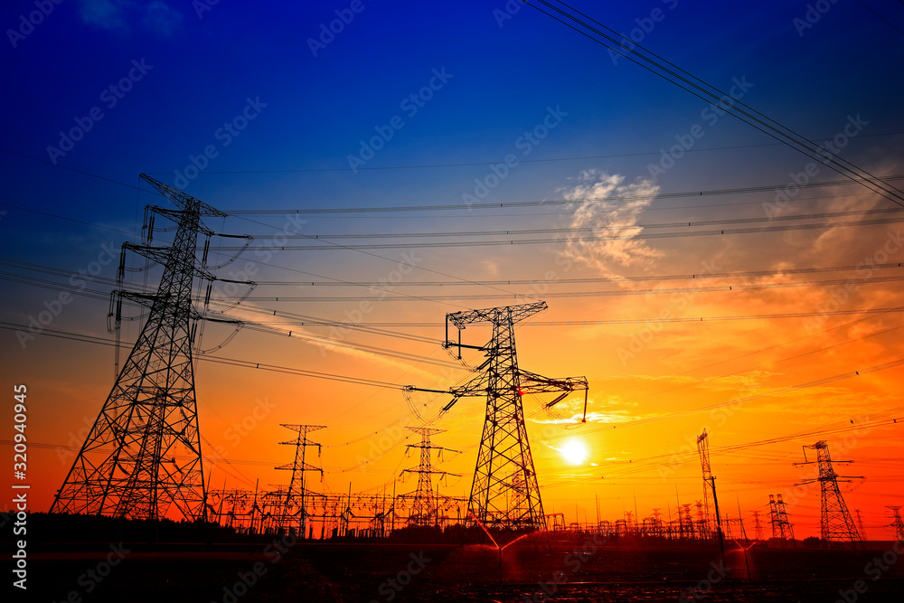 Electric tower, silhouette at sunset