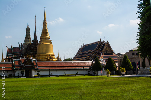 Wat Phra Kaew temple of the Emerald Buddha is regarded as the most sacred Buddhist temple in Bangkok Thailand.