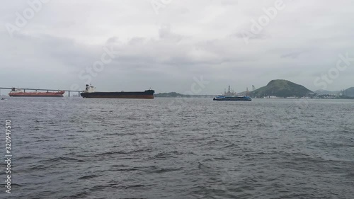 Water transport with various types of vessels in Guanabara Bay, between Niterói and Rio de Janeiro. photo