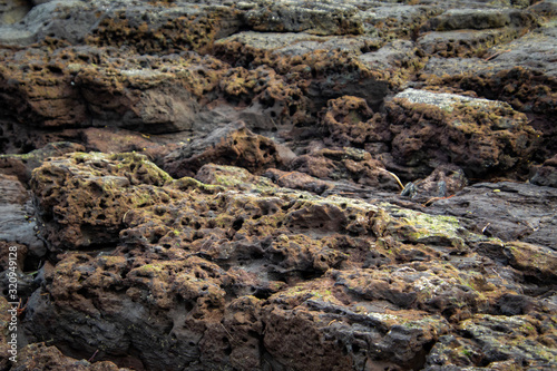 black rocks on the beach