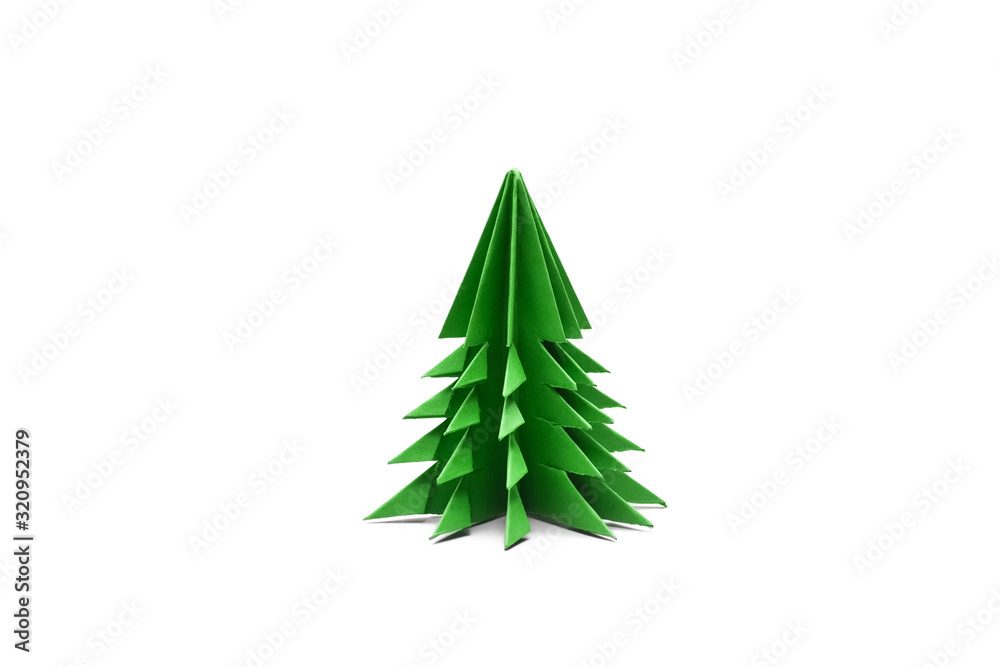 Obraz premium Green origami christmas tree isolated on white background