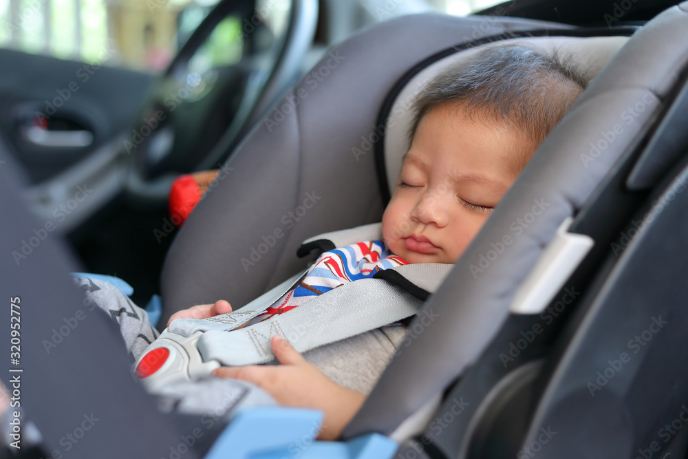 cute baby boy sleeping in car seat safety belt lock protection drive road trip travel cute baby boy sleeping in car seat safety belt lock protection drive road trip travel