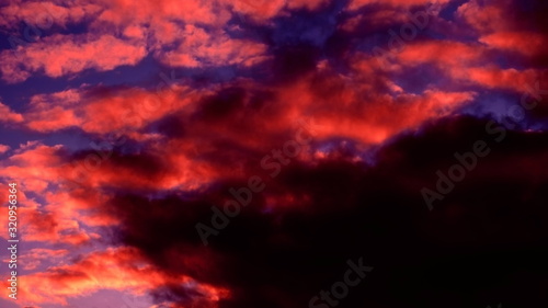 Clouds in the sky during sunset. Beautiful photo for your design © Vitaly Loz