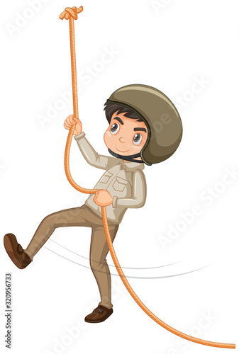 Boy in safari outfit climbing rope on white background