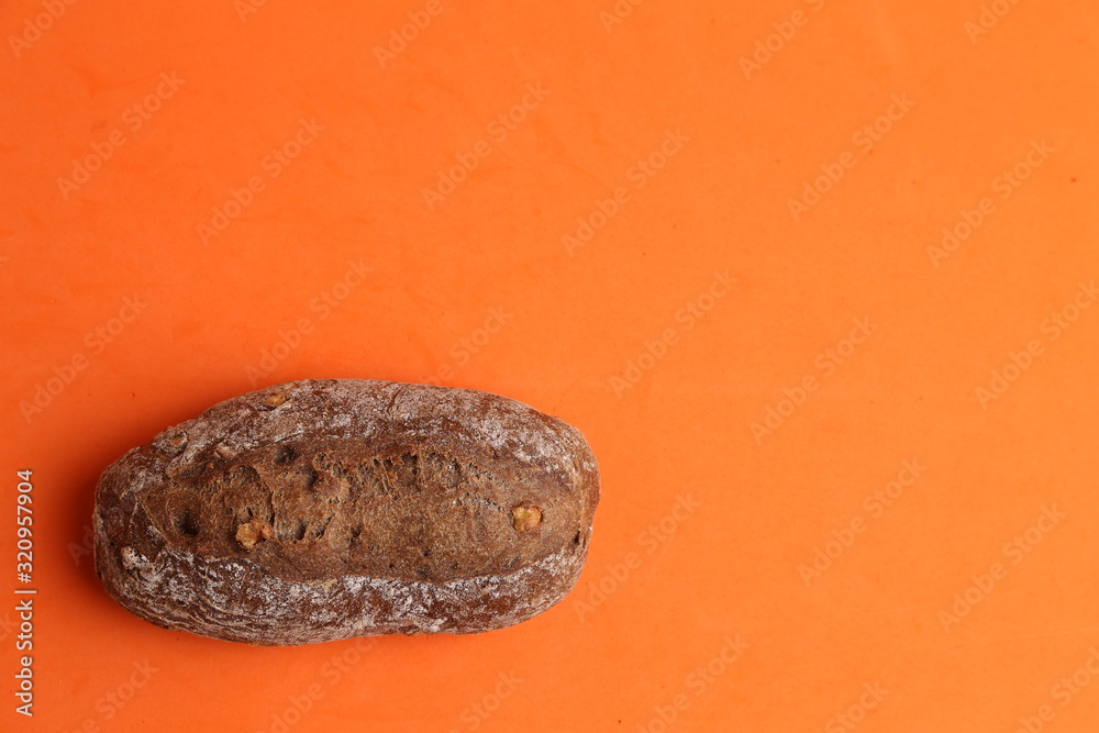 Fototapeta premium artisanal brown bread with nut pieces