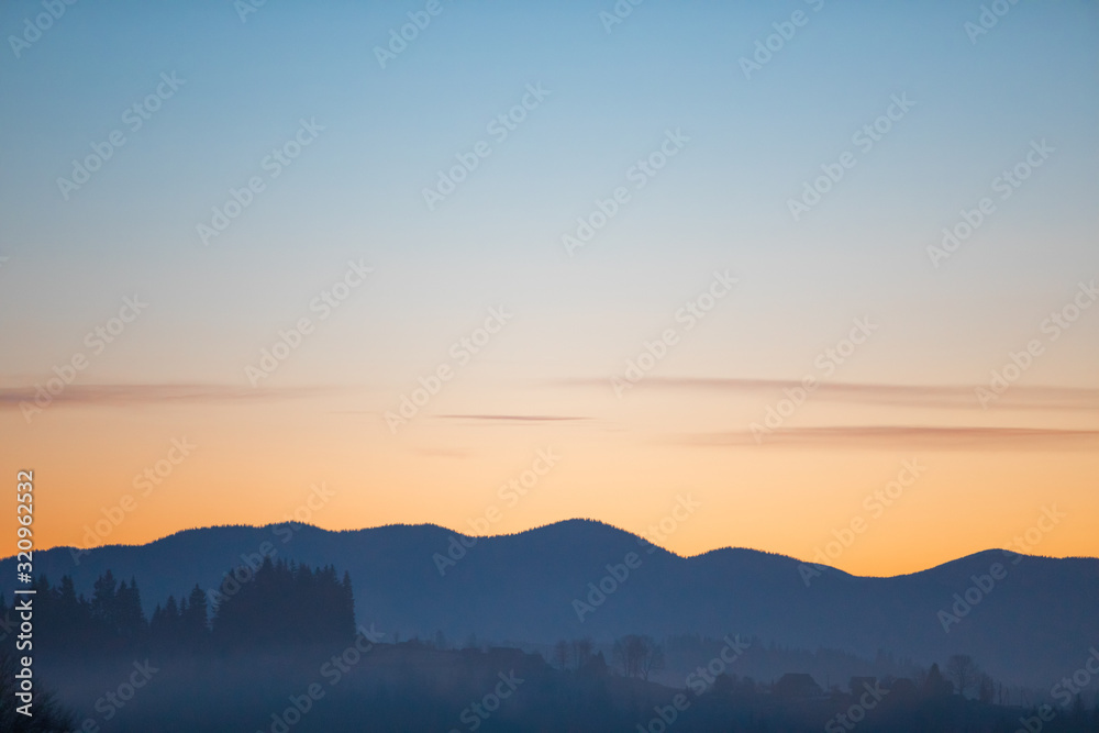 view of sunrise in mountains range