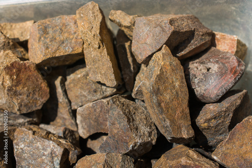 Bronzite gemstone as natural mineral rock photo