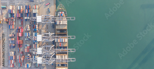 Aerial view container ship to sea port loading container for import export or transportation. shipping business logistic. Trade Port and Shipping cargo to harbor, International transportation.