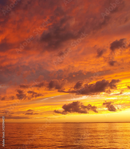 Orange coloured stratocumulus cloudy coastal Sunset Seascape. Australia photo