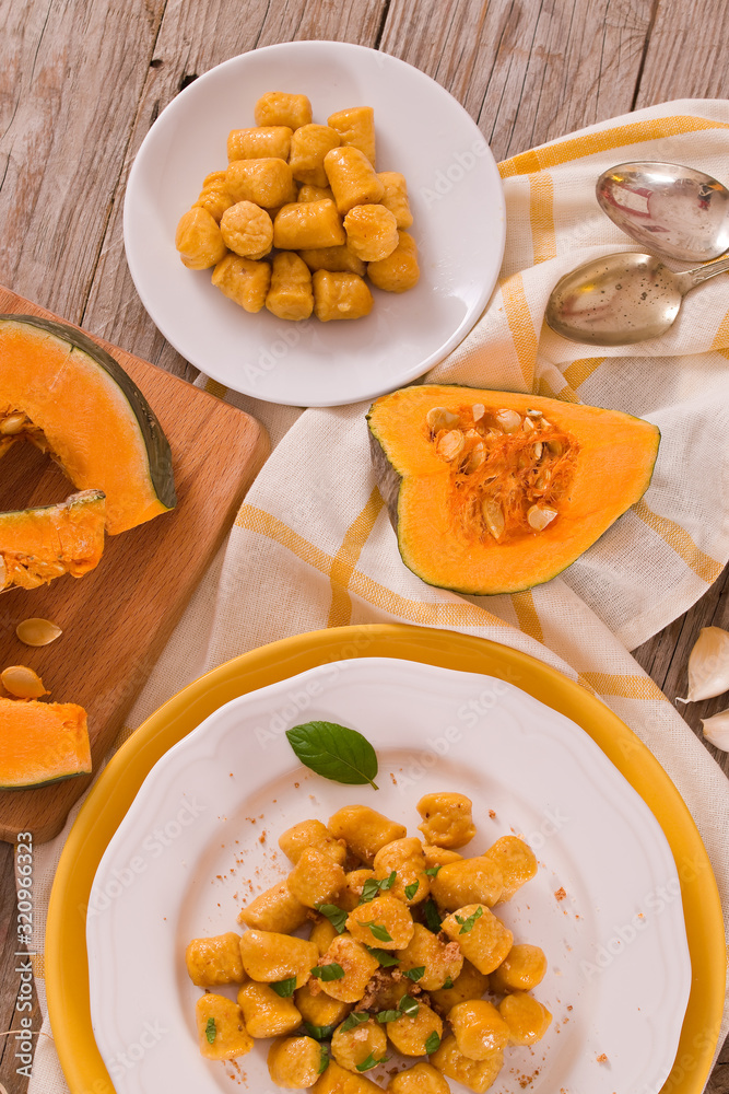 Pumpkin gnocchi with grated amaretti cookies.