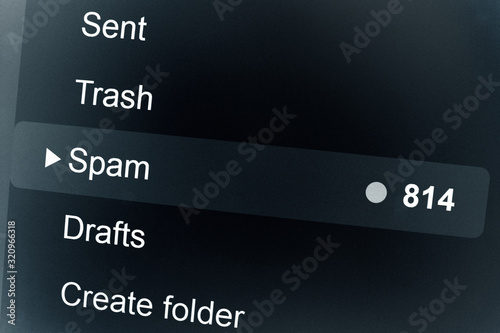 Black mail interface with the word SPAM. The concept of fighting unwanted emails. photo