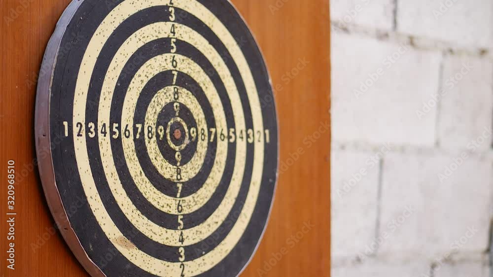Arrow hitting at the dartboard slow motion shot. Arrow hitting at the dartboard slow motion shot.