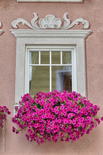 Decorated window on the facade of a house