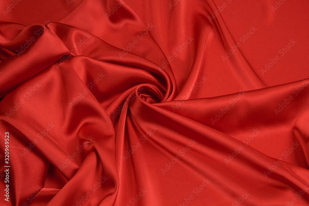 Fabric satin silk drapery. Red textile