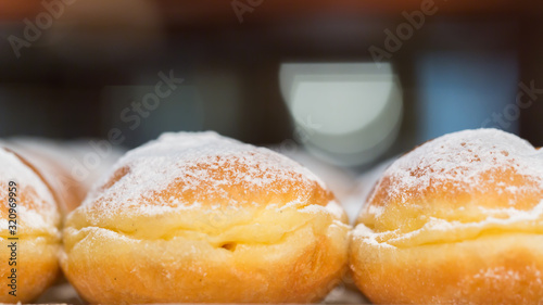 Photography Macro (side shot) of austrian Krapfen (doughnuts)