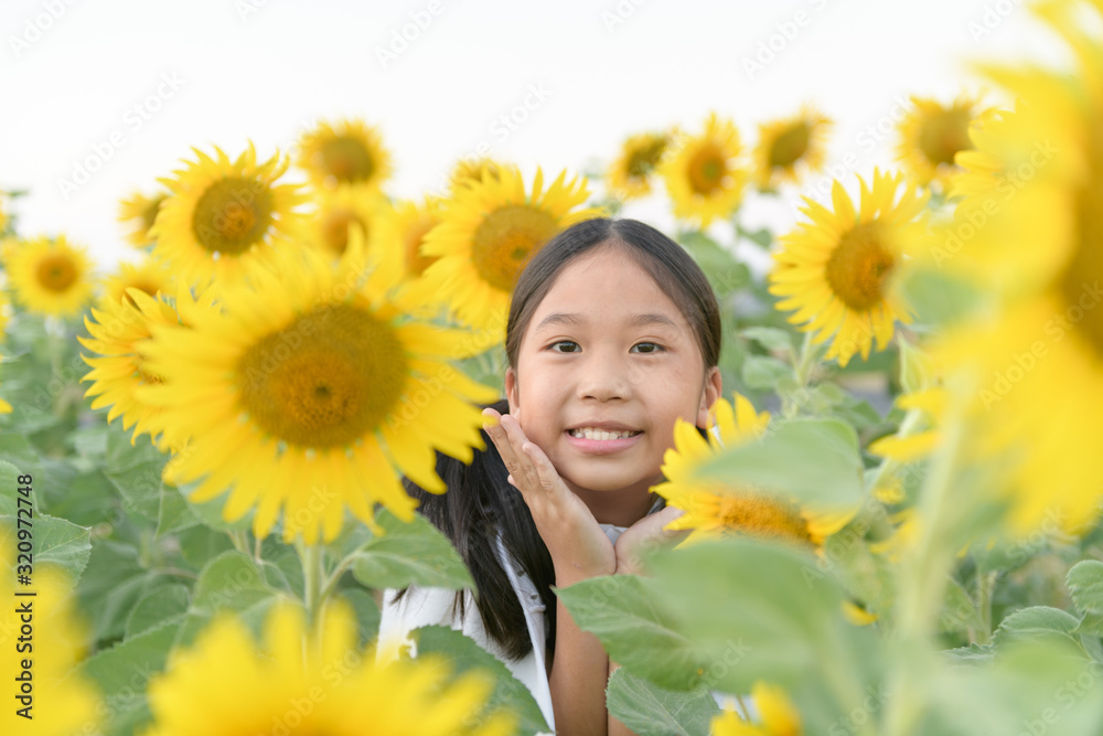 Happy cute asian girl smile with sunflower, Happy cute asian girl smile with sunflower,