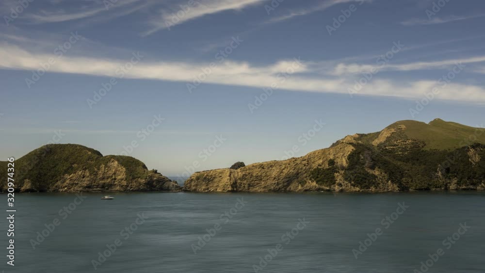 Time lapse of sailing into the entrance to Tory Channel from Cook Straight, looking towards the headland and islands to the West. Tory Channel, Marlborough Sounds, New Zealand. Time lapse of sailing into the entrance to Tory Channel from Cook Straight, looking towards the headland and islands to the West. Tory Channel, Marlborough Sounds, New Zealand.