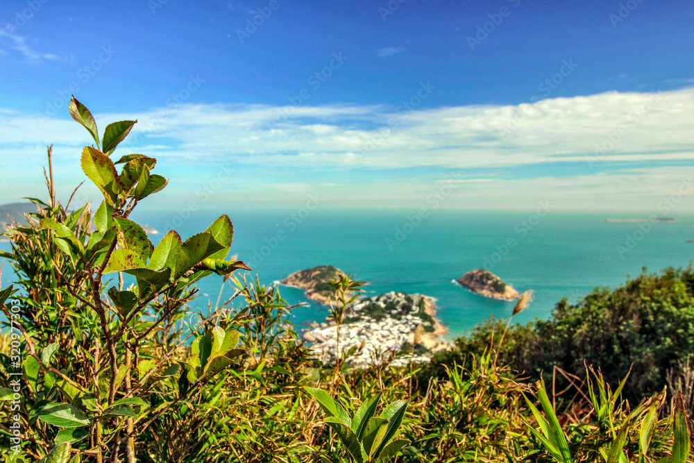 This picture was taken almost from the top of the Dragons back trail. Shek O Road leads here. Here you can forget that the big noisy city as Hong Kong is near here. This picture was taken almost from the top of the Dragons back trail. Shek O Road leads here. Here you can forget that the big noisy city as Hong Kong is near here.