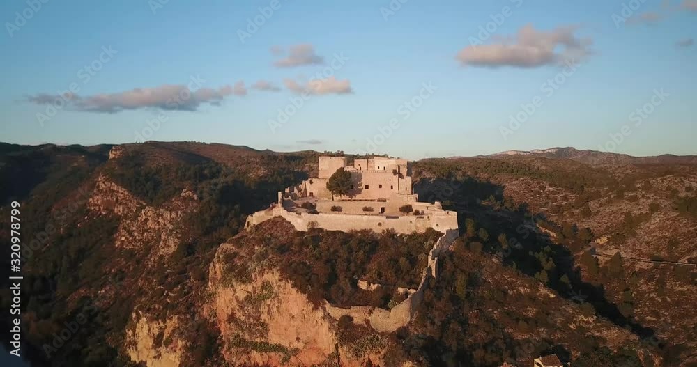 Aerial towards sunset castle top hill Aerial towards sunset castle top hill