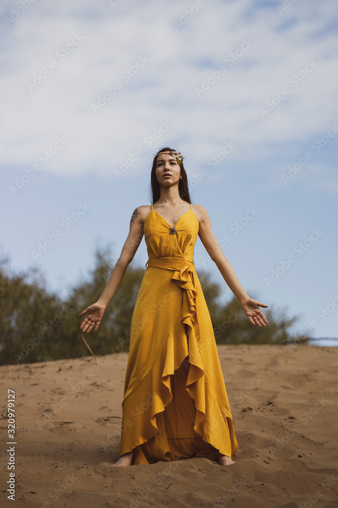 Attractive girl in the yellow dress Attractive girl in the yellow dress