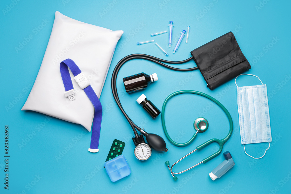 First aid kit on color background First aid kit on color background