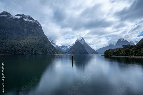 A long exposure photo of Mitre Peak in Milford Sound on a very cloudy day.