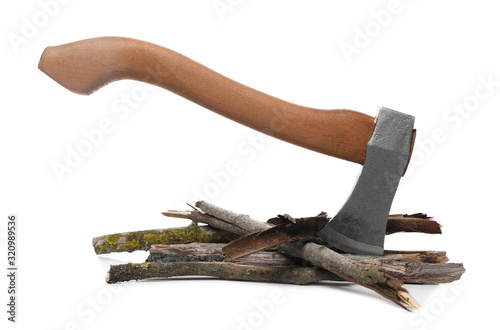 Camping hatchet, ax for bushcraft with pile of wood, branches isolated on white background