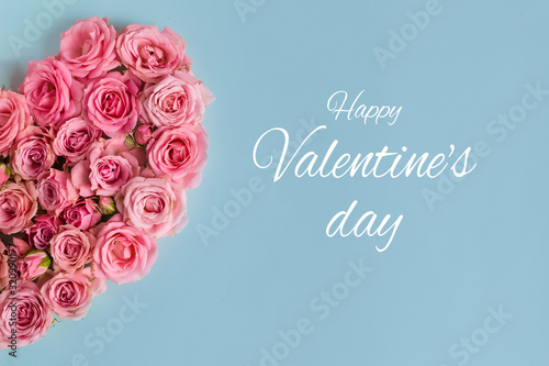 Valentine's day romantic greeting card. Composition with a heart of pink roses on a blue background.Mothers day. 8 Marth. Banner for advertising store, website, posters, advertising, coupons.