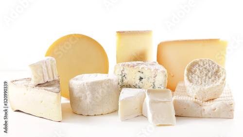 selection of various french cheese portion isolated on white background photo