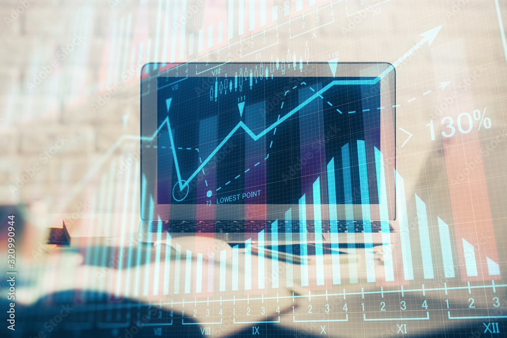 Forex market graph hologram and personal computer on background. Double exposure. Concept of investment. Forex market graph hologram and personal computer on background. Double exposure. Concept of investment.