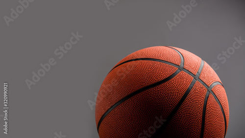 Basketball isolated over grey background © PEPPERSMINT