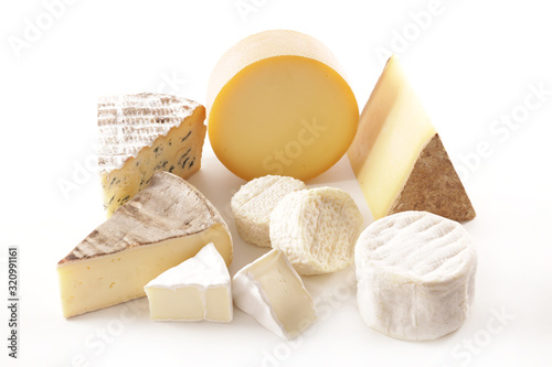 selection of various french cheese portion isolated on white background