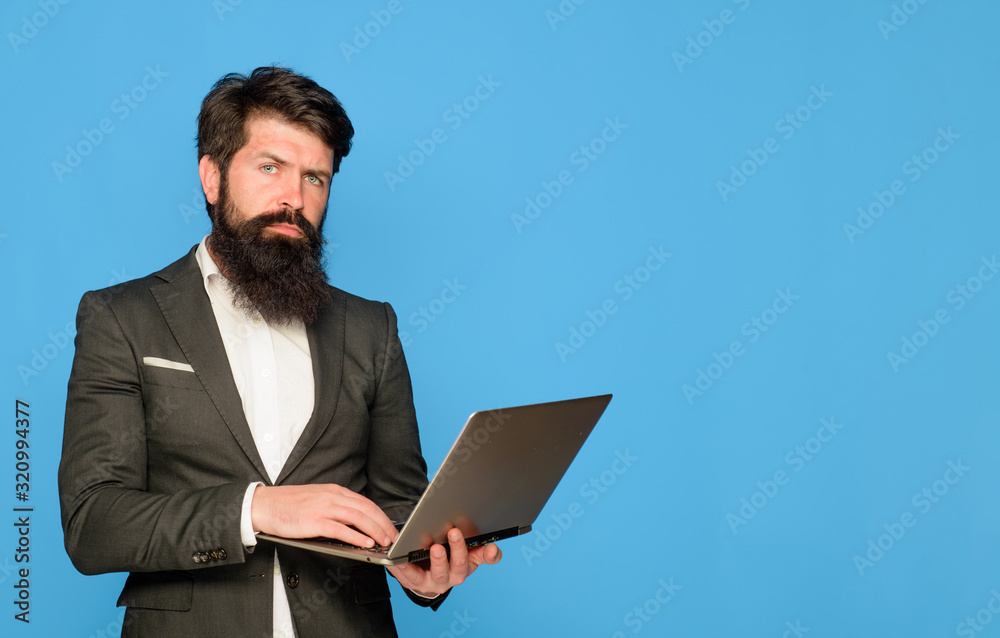 Business, office, technology, internet. Businessman with computer at office. Serious man with laptop computer at office. Business man working with laptop. Businessman working with notebook in office. Business, office, technology, internet. Businessman with computer at office. Serious man with laptop computer at office. Business man working with laptop. Businessman working with notebook in office.