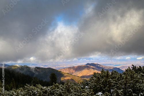 Low clouds covering the surrounding peaks in Retezat Mountains National Park © Cosminxp