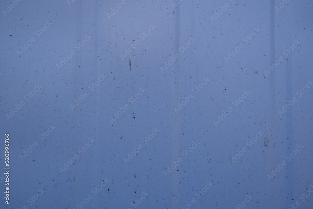Fototapeta premium steel sheet metal, blue background, roofing and roofing, a piece of corrugated board