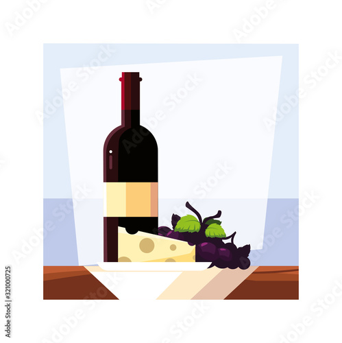 wine bottle with cheese and grapes