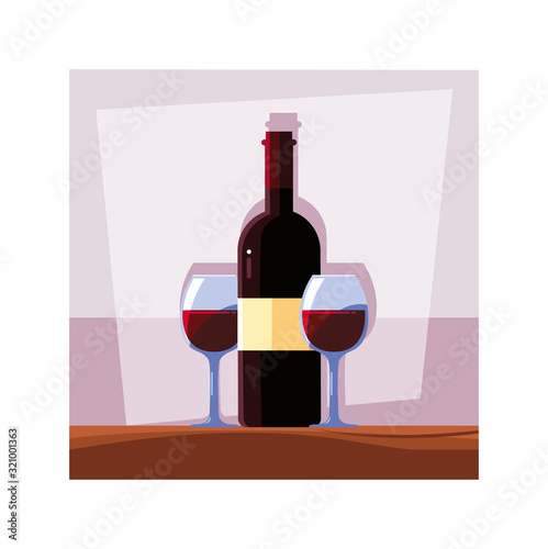 bottle and glass of wine on table