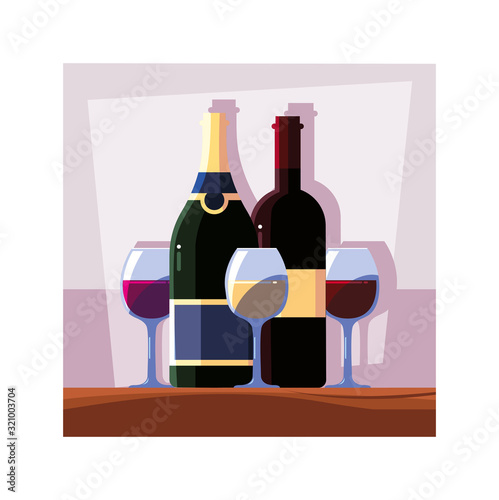 bottle and glass of wine on table