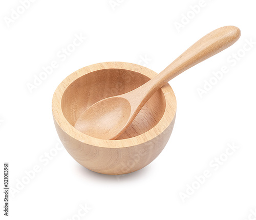 Wooden bowl and wooden spoon isolated on white background with clipping path.
