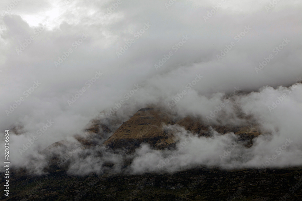 Lake Wakatipu New Zealand. Mountains The Remarkables. Fog and clouds