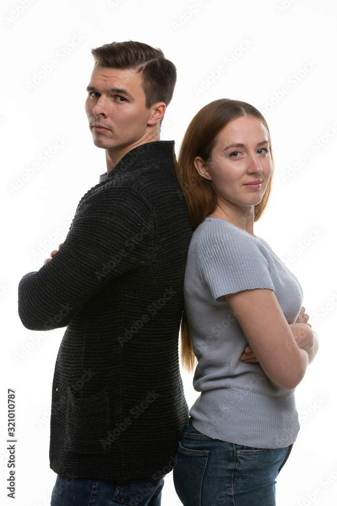 The young great stood with his back to each other and looked into the frame The young great stood with his back to each other and looked into the frame