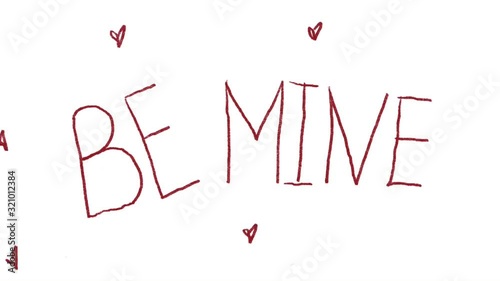 A cute video declaration of love for Valentine's Day. We draw hearts by hand in red pencil and the inscription be mine with many small hearts.